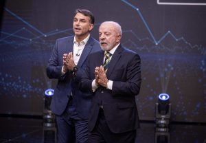 Lula e Flávio Bolsonaro no debate da TV Globo